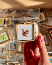 mini watercolor painting of a squirrel