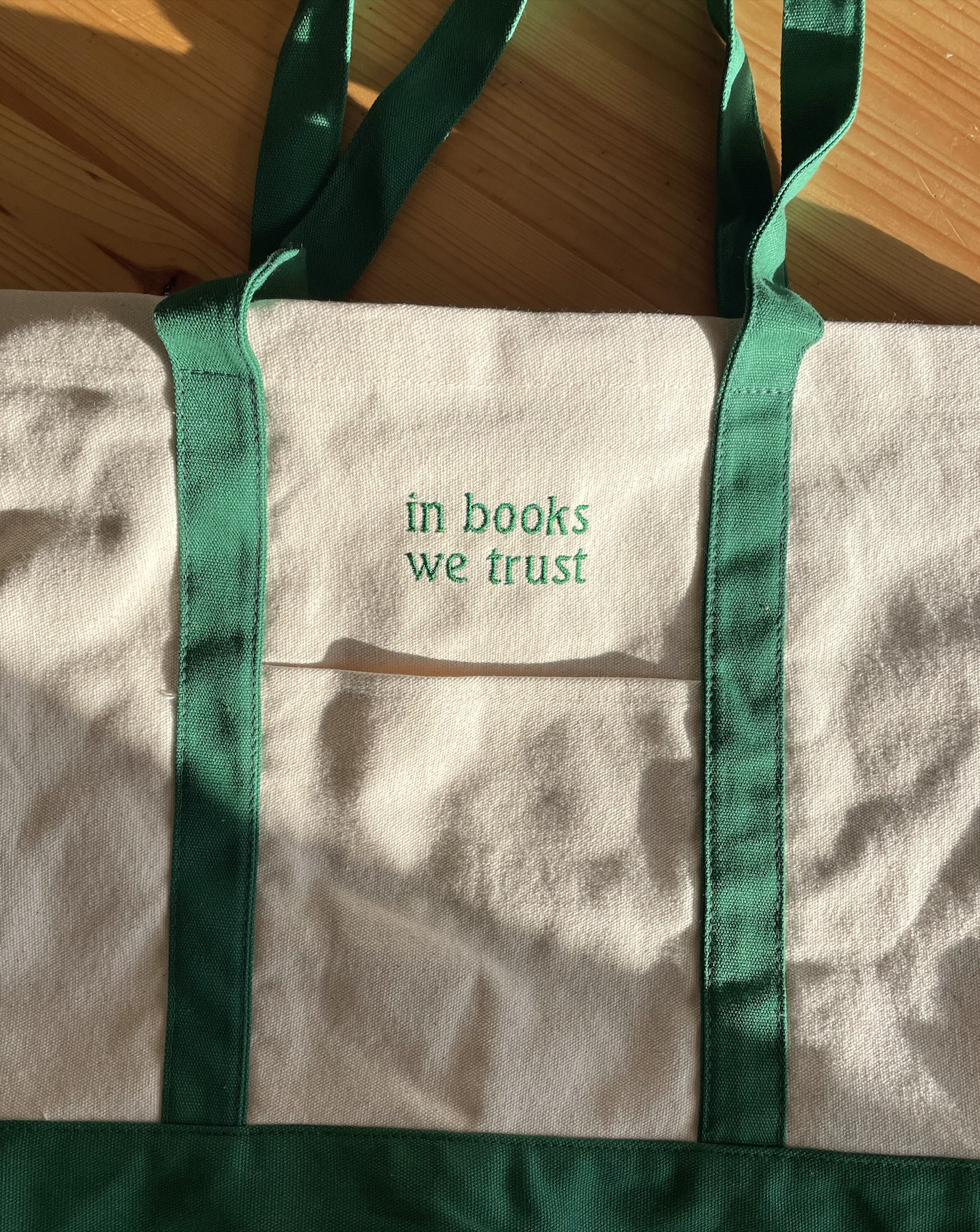 in_books_we_trust_green_tote_bag.png